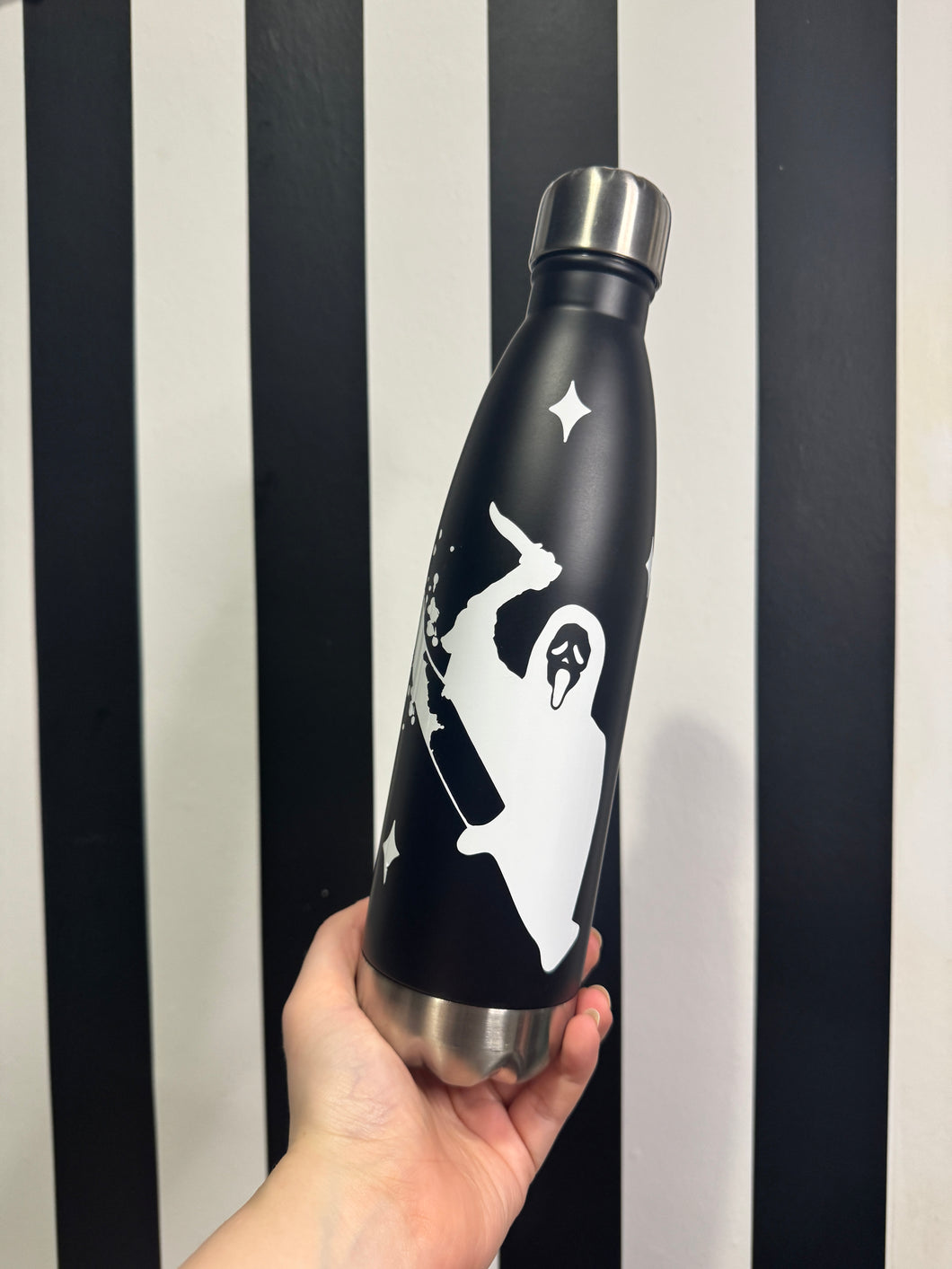 Black Bottle with White Scream