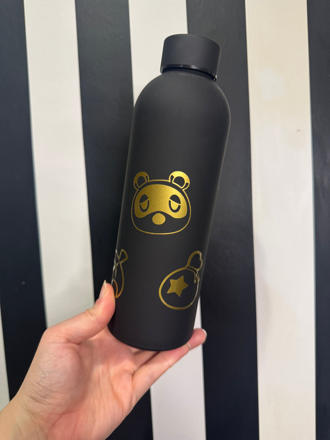 Black Bottle with Gold Animal Crossing